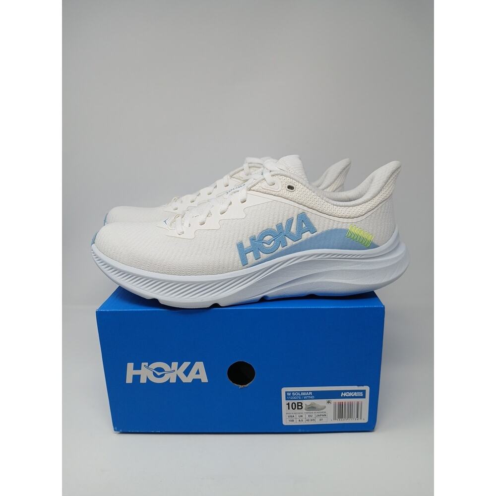Hoka One One Women's White Athletic Running Shoes with Blue Logo and Neon Accent